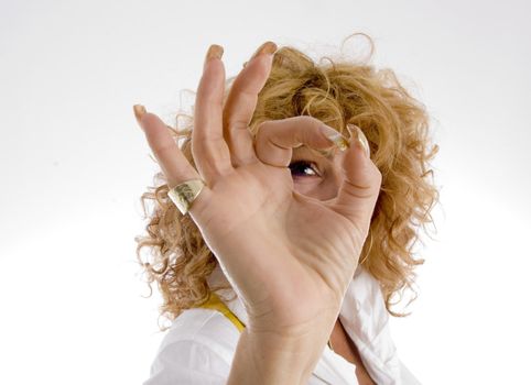 woman showing ok sign on an isolated background