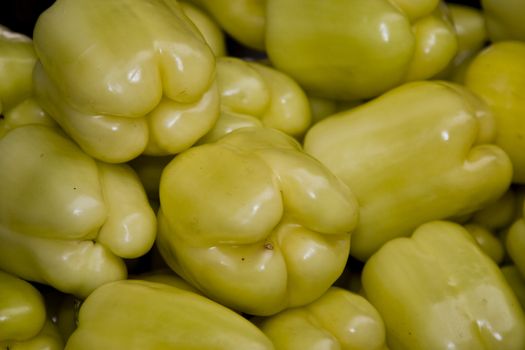 Bell peppers arranged at the market stand