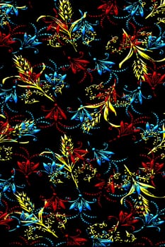 texture of red, blue and yellow flowers on black background