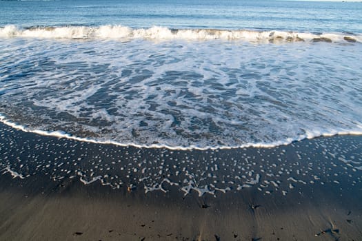 Image of Wave on sand