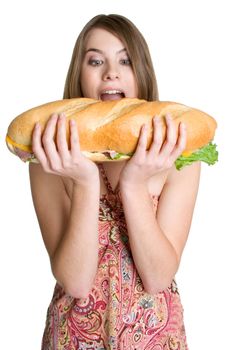 Pretty teen girl biting sandwich