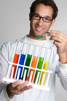 Man holding scientific chemicals in test tubes