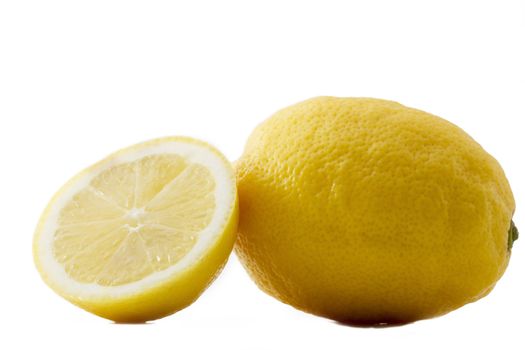one lemon and a half on white background
