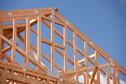Abstract of New Home Construction Site Framing.