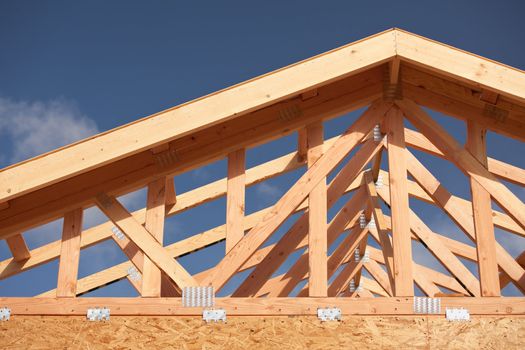 Abstract of New Home Construction Site Framing.