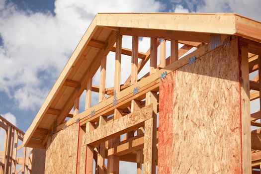 Abstract of New Home Construction Site Framing.