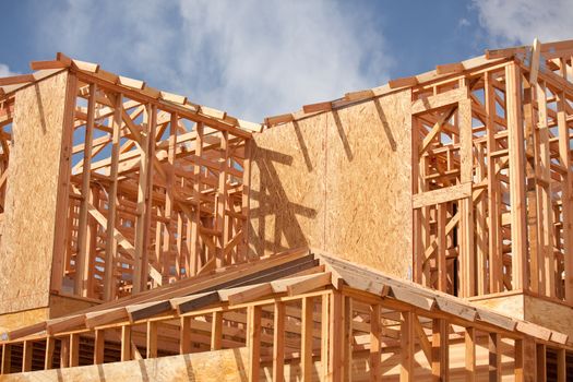 Abstract of New Home Construction Site Framing.
