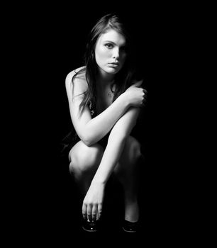 Portrait of beautiful young fashion model in black and white