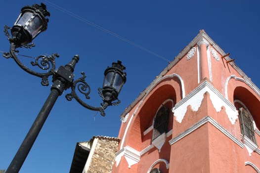 Red house and lamp in San Cristobal