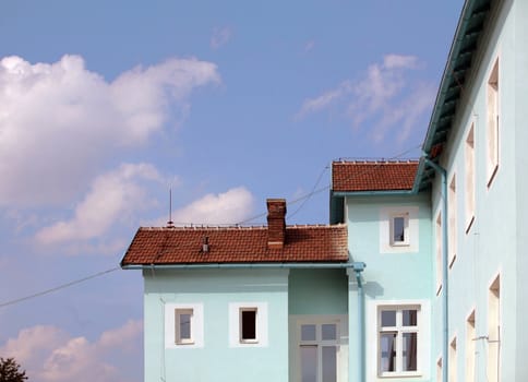 Exterior of building with red roof