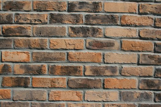 Close up of a brickwall showing unique pattern.
