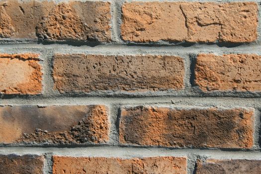 Close up of a brickwall showing unique pattern.
