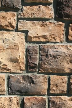 Close up of a brickwall showing unique pattern.
