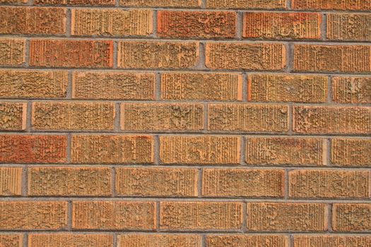 Close up of a brickwall showing unique pattern.
