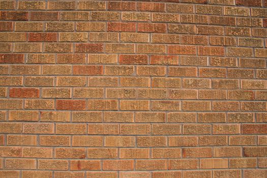 Close up of a brickwall showing unique pattern.
