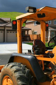 Bulldozer at the new house construction site.
