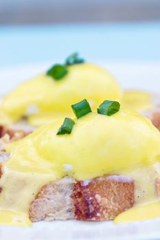 Poached eggs on with hollandaise sauce on toast.