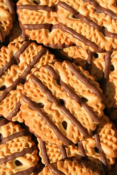 Close up of chocolate striped shortbread cookies.
