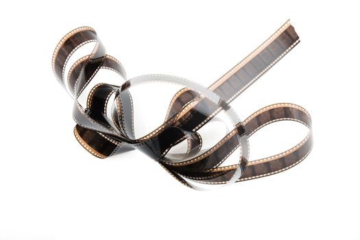 Detailed close-up of an film strip, film reel on white