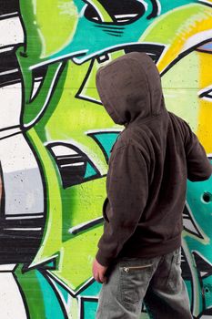 Young boy before graffiti
