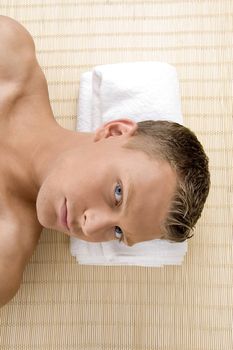 close up of man at spa with white background