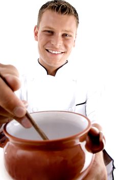 smart chef cooking in porcelain pot isolated on white background