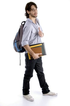 full body pose of student holding his books with white background