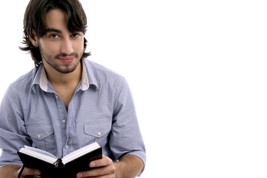 young male with his diary on an isolated white background