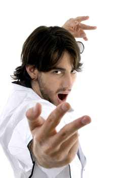 man in chef uniform performing karate stance on an isolated white background