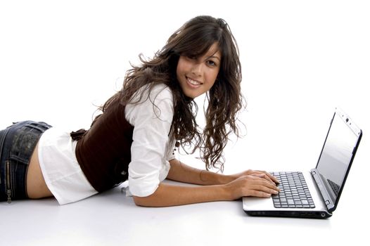 teen busy with laptop isolated on white background