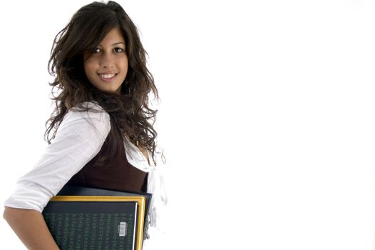 portrait of college student holding study material on an isolated white background