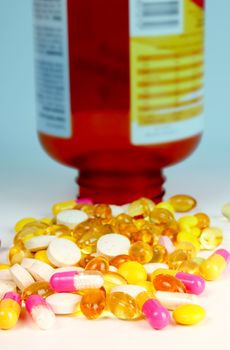 A stack of different coloorful tablets