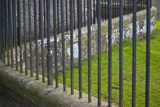 detail of a fence going in waves