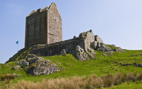 Smailholm tower in southern Scotland on a sunny day