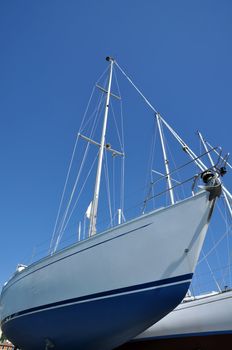 sailboats in a dockyard