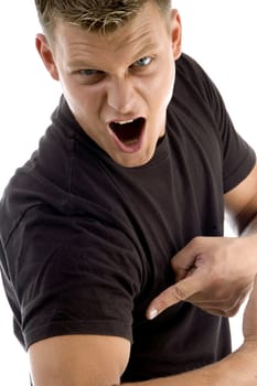 man pointing his muscles on an isolated background