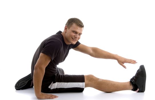 male stretching his leg on an isolated background