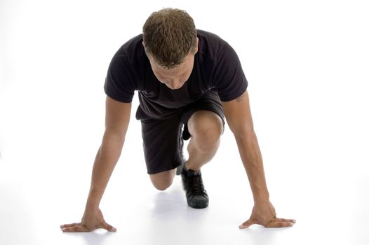 man doing push ups against white background