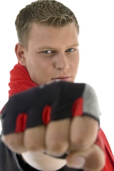 man showing punch against white background