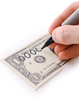 Male hand draw nil on dollar photographed on a white background
