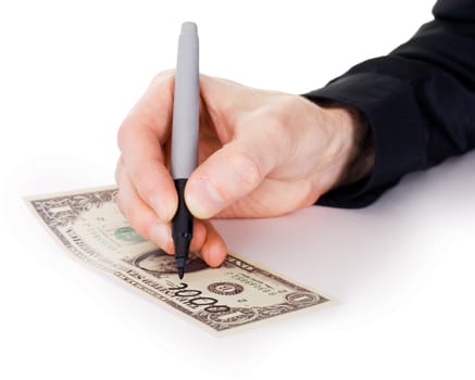 Male hand draw nil on dollar photographed on a white background