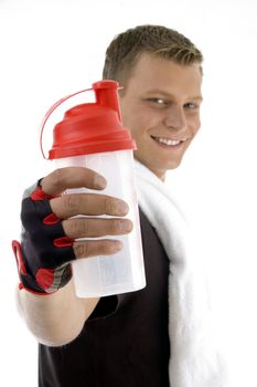 exercising male showing bottle with white background