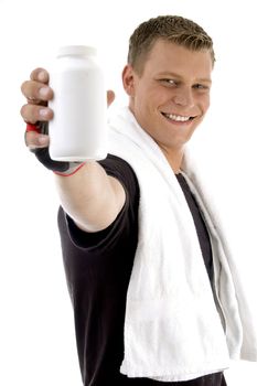 pleased man showing bottle on an isolated white background