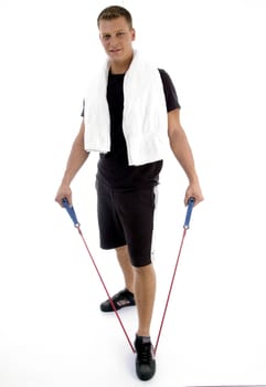 standing man with exercising rope on an isolated background