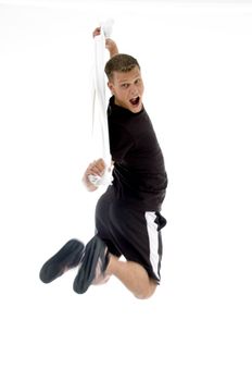 jumping man holding towel against white background