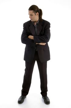 standing businessman with folded hands on an isolated background