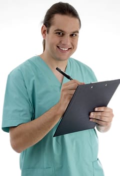 handsome surgeon writing prescription with white background