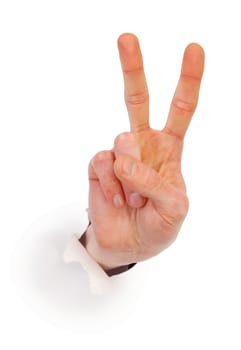 Gesture male hand through white paper photographed on a white background