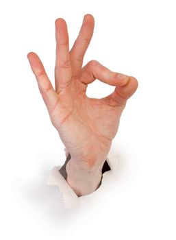 Gesture male hand through white paper photographed on a white background