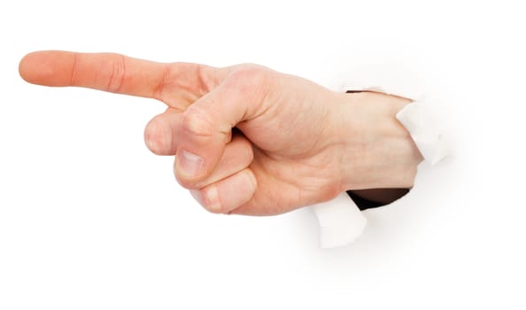 Gesture male hand through white paper photographed on a white background